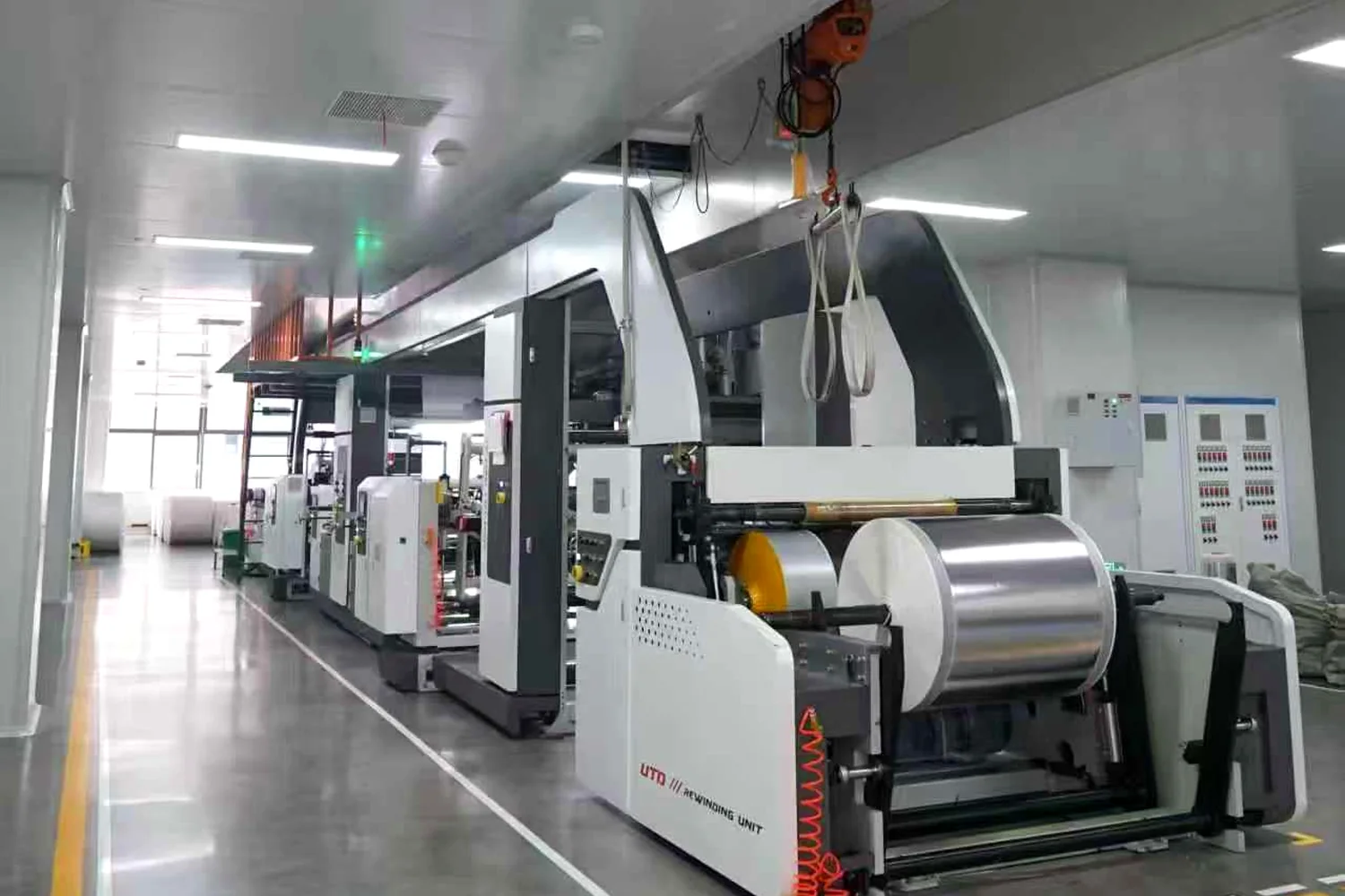 Partner roll-fed converting equipment supporting custom paper bag projects