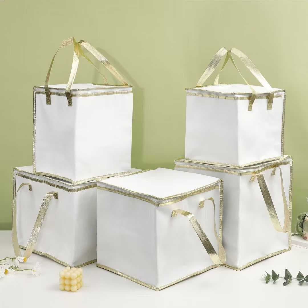 Reference white box-shaped insulated carry bags with handles and zip closures; sizes and performance confirmed per project